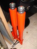 Original struts painted Koni orange and with Koni inserts